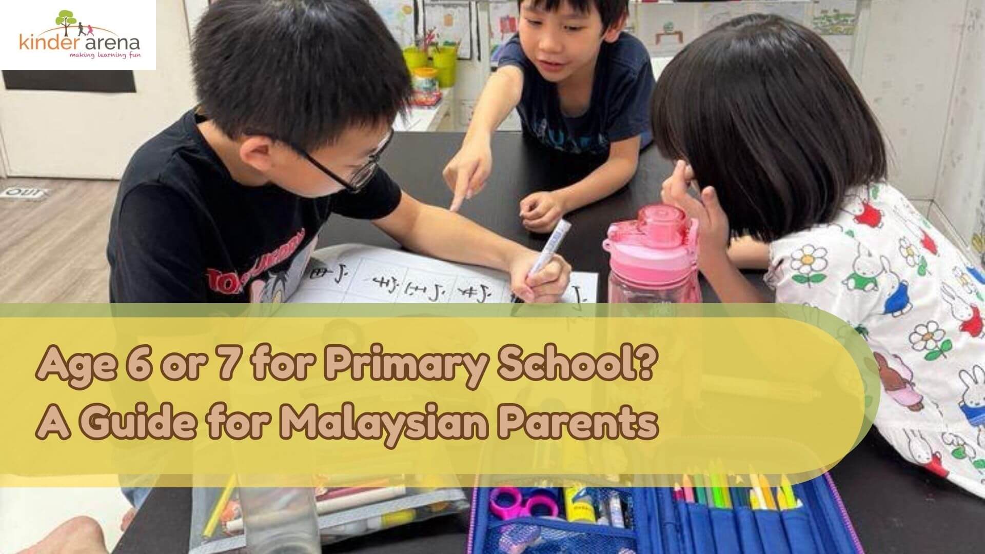 Age 6 or 7 Primary student doing homework together at Kinder Arena