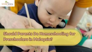 Parent holding a child's hand to practice writing during homeschooling for preschoolers in Malaysia.